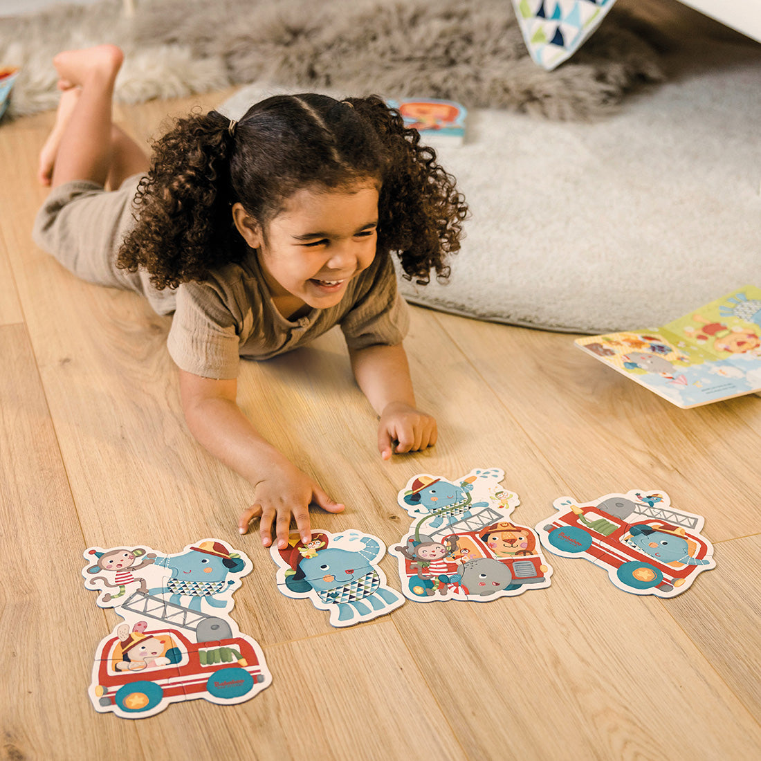 Lolo's Fire Fighter Figure Puzzle lifestyle image with child