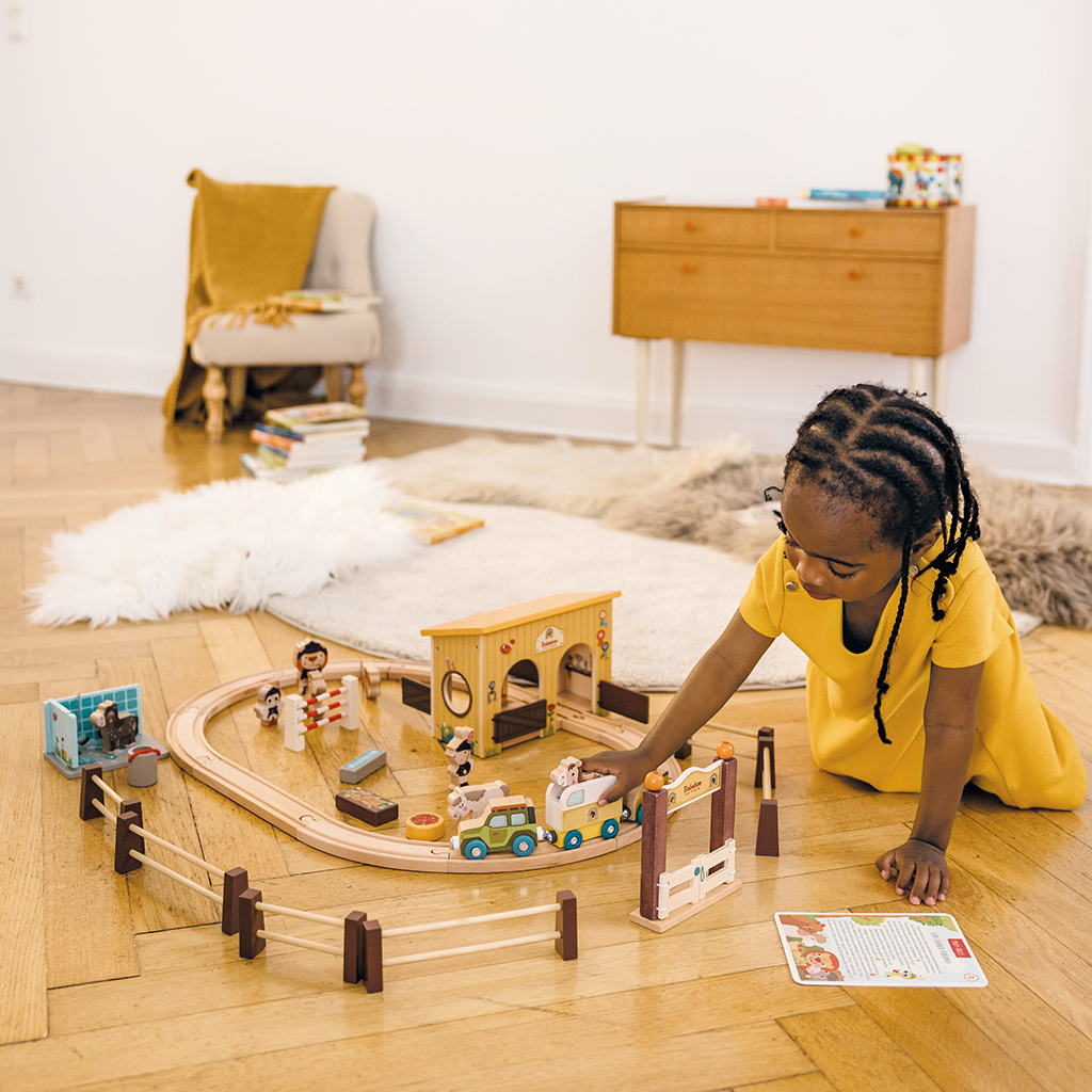 Horse Stable Play World lifestyle image with child